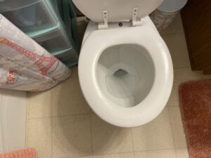 A toilet with water inside it