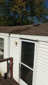 A brown shingled mobile home roof