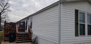 A singlewide with mobile home gutters