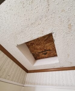 A skylight in a mobile home that has been boarded over