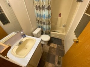 A small bathroom in a mobile home