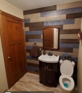 Bathroom remodel with new walls and cabinets