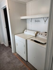 A laundry area with a washer and dryer