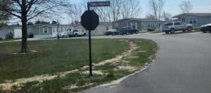 A stop sign in a mobile home park
