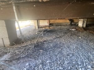 a view of the crawl space under a mobile home
