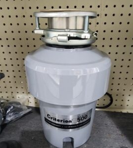 A gray colored garbage disposal