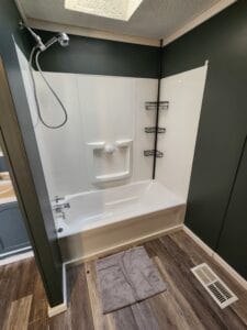 White shower with gray walls