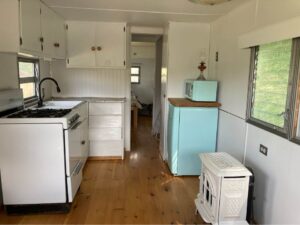 A kitchen area inside a mobile home