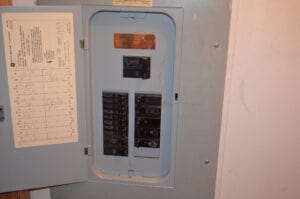 A breaker box with a cover on it