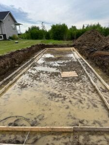 Water sitting in a foundation area for a mobile home