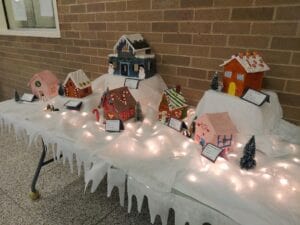 A Christmas village with little houses and lights