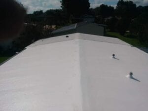 mobile home rubber roofing installed on a singlewide