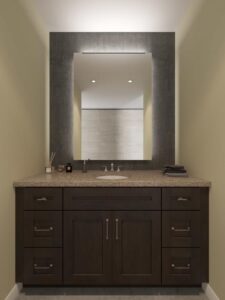 A large dark wooden cabinet in a bathroom with mirror