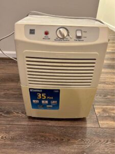 A yellow stained dehumidifier