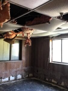 A ceiling falling in on a mobile home