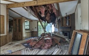 A ceiling collapsed in from water damage