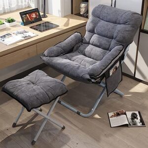 A small chair that reclines and foot stool