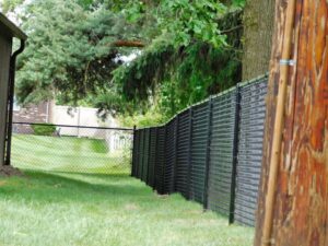 A chain link fence around a yard