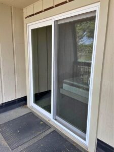 A sliding glass door that is about 6 ft wide