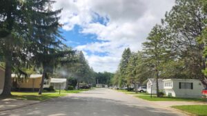 A view of a street with mobile homes down it