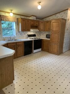 A lighted kitchen in a mobile home