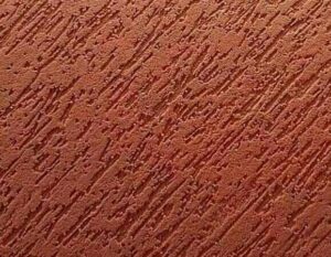 A red textured wall that is beautiful