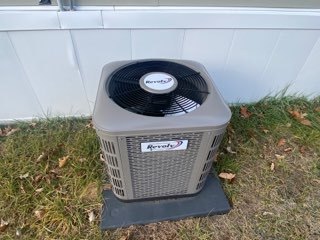 A large outside air conditioning unit that is clean