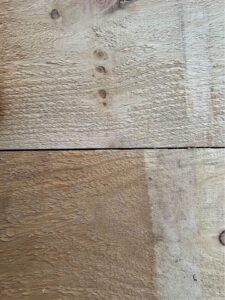 A close up of what cedar siding looks like