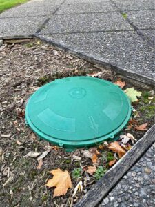 A septic tank with an installed riser