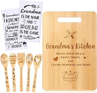 A cutting board and mixing spoons with designs on them