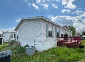 A long shot picture of a doublewide mobile home