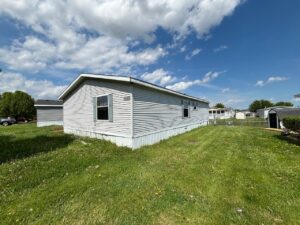 A side view of a doublewide mobile home