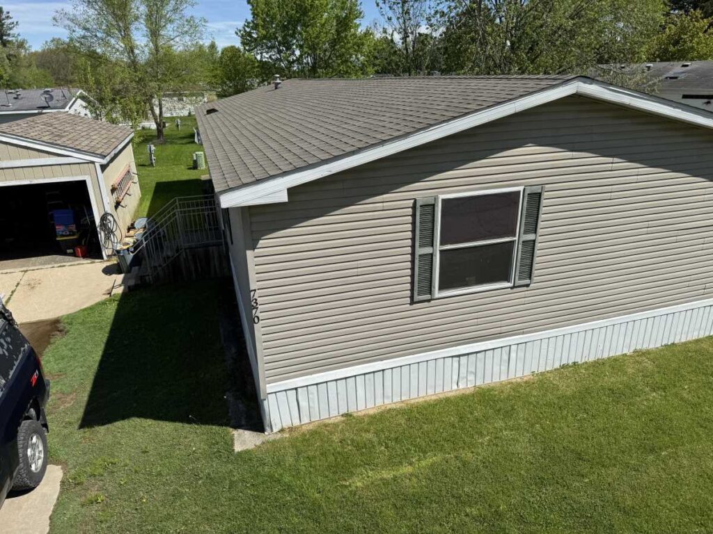 a doublewide mobile home with dimensional shingles